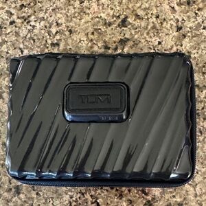 TUMI Glossy Black Travel Case